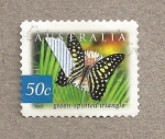 Stamps Oceania - Australia -  Mariposa moteada en triangulo verde