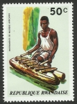 Stamps Rwanda -  Instrumento africano de percusión