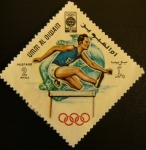 Stamps : Asia : United_Arab_Emirates :  Umm-al-Qiwain. Olimpiadas Mexico 1968. Carrera vallas.