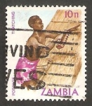 Stamps Zambia -  Cubriendo la choza con paja