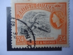 Sellos de Africa - Reino Unido -  Mining for Bauxita - British Guiana.