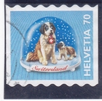 Sellos de Europa - Suiza -  bolas de nieve- perros san Bernardo