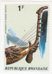 Stamps Rwanda -  instrumento musical africano