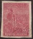 Stamps : America : Argentina :  Labrador surcando tierra arado de mano Sol naciente  1911 sin d