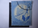 Stamps Egypt -  UAR -Egipto - Carga y Descargue de Productos - Emblema de Estado