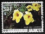 Sellos de Africa - Comores -  Flores - Alamanda cathartica