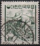 Stamps South Korea -  Campesino cosechando Arroz