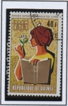 Stamps Guinea -  Año d' Libro: Joven con flor y Libro