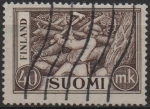 Stamps Finland -  Leñador