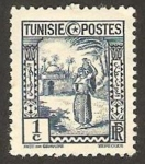 Stamps Tunisia -  mujer llevando tinaja