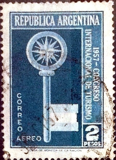 Intercambio 0,20 usd  2 pesos 1957