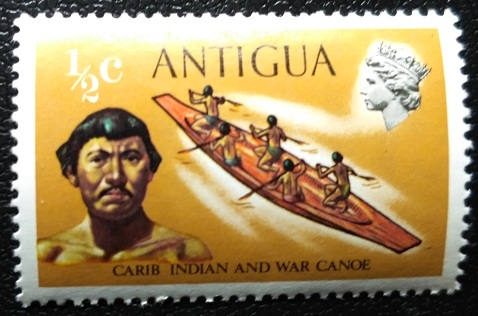 Carib indian and war canoe